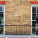 Arched timber sash window beside the title “Do you need planning permission to replace your windows?”